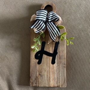 Charming Wooden Wall Plaque with Black Letter and Greenery
